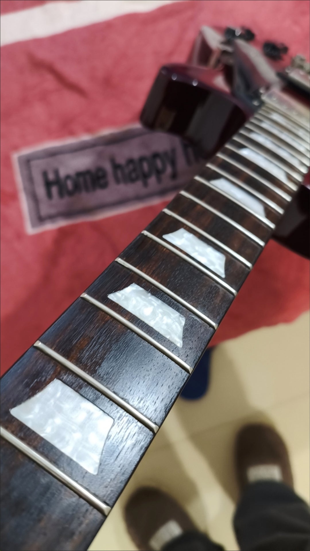 Close-up of a guitar neck by FOGOOXRguitar polish Oil and Clean